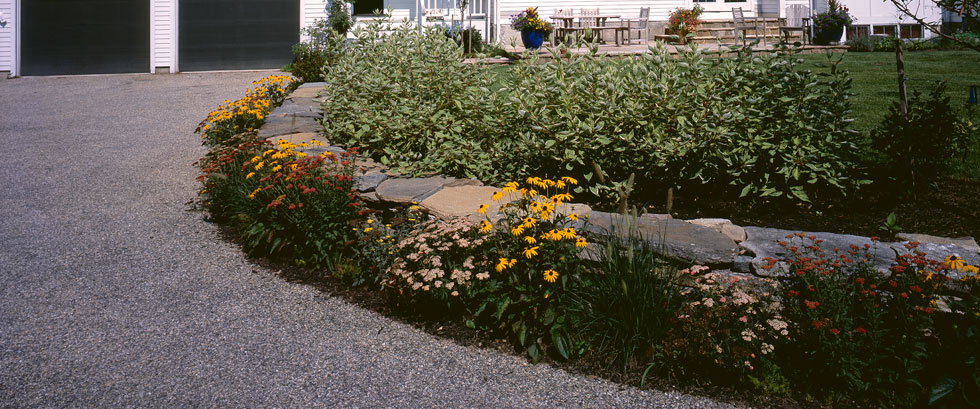 Dry-Stack-Stone-Wall-with-Perennial-Bed